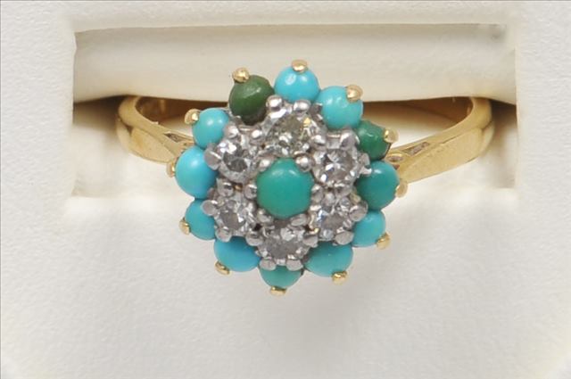 A TURQUOISE AND DIAMOND TWO ROW CIRCULAR RING, diamonds set in white gold, turquoise set in yellow