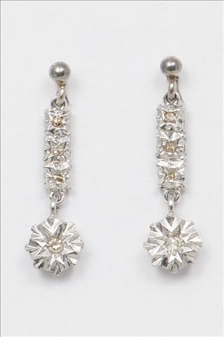 A PAIR OF DIAMOND DROP EARRINGS ILLUSION SET, circular with three small eight cut diamonds set in