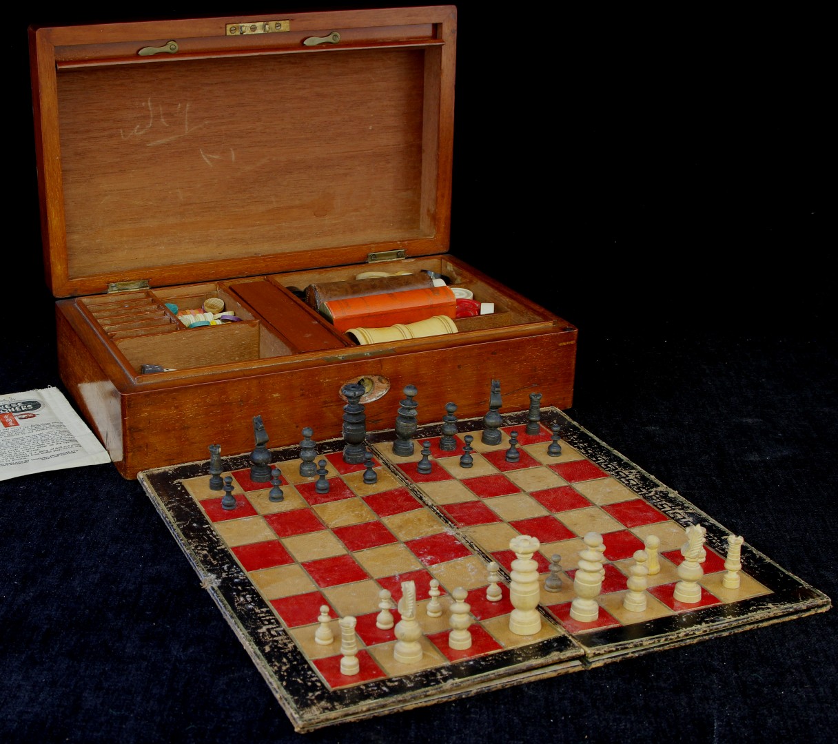 A late 19th/early 20th century games compendium, the rectangular brass inlaid mahogany box with