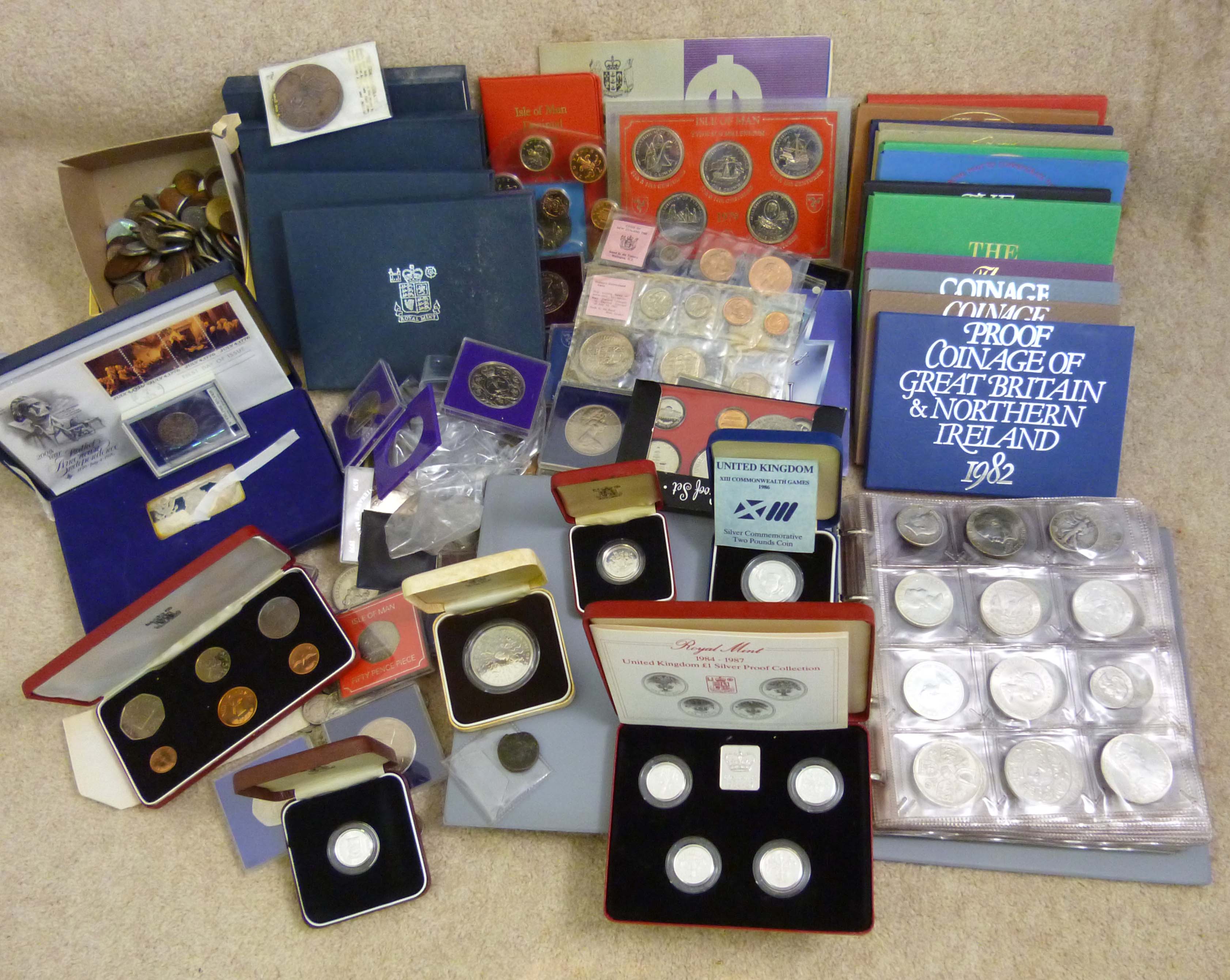 A large collection of assorted coinage comprising a cased silver proof medal dated 1976, approx