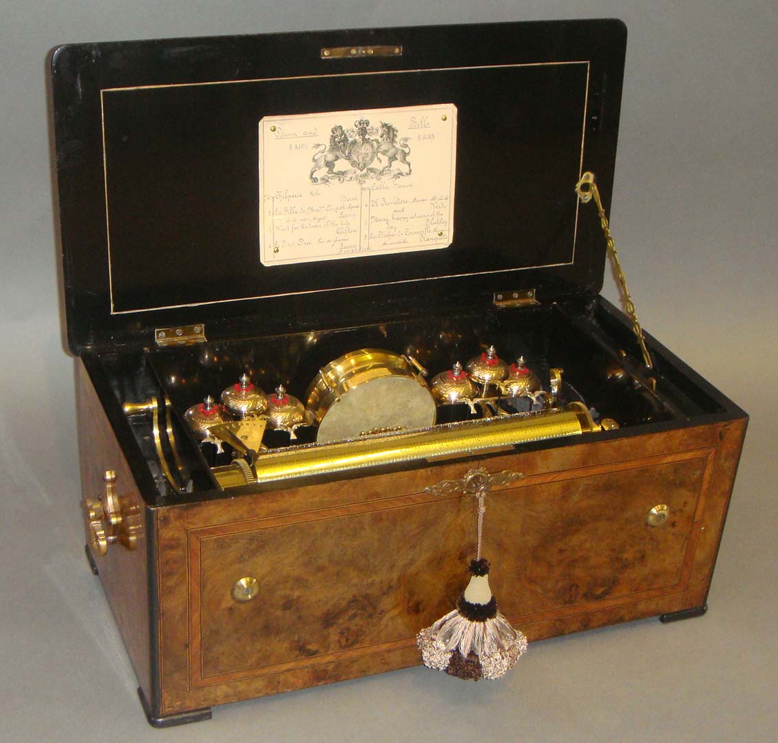 A superb quality 19th century drum and bells eight air cylinder music box, the central drum