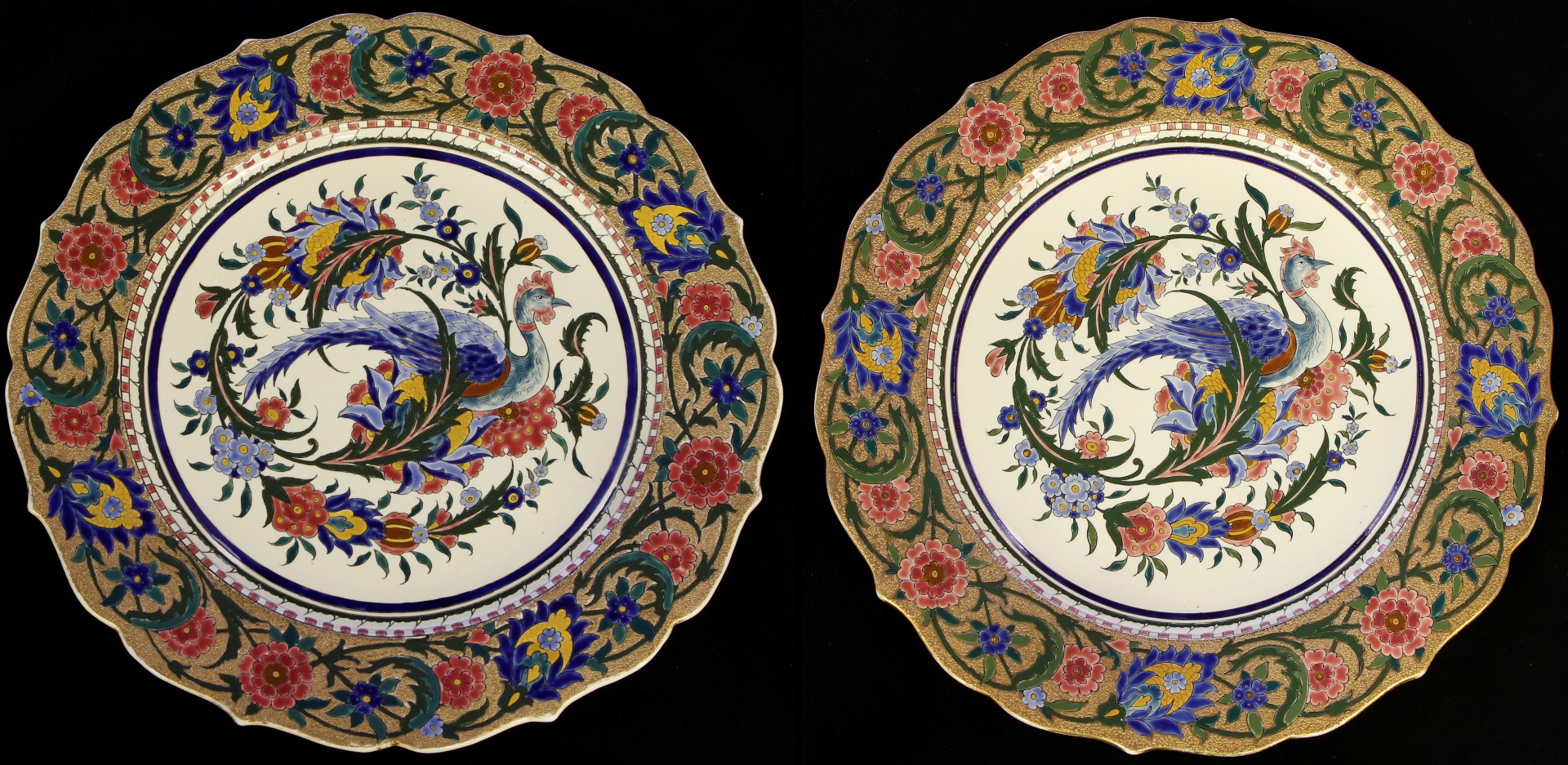 A pair of Bohemian Dallwitz Continental hand painted chargers, decorated with Birds of Paradise, and
