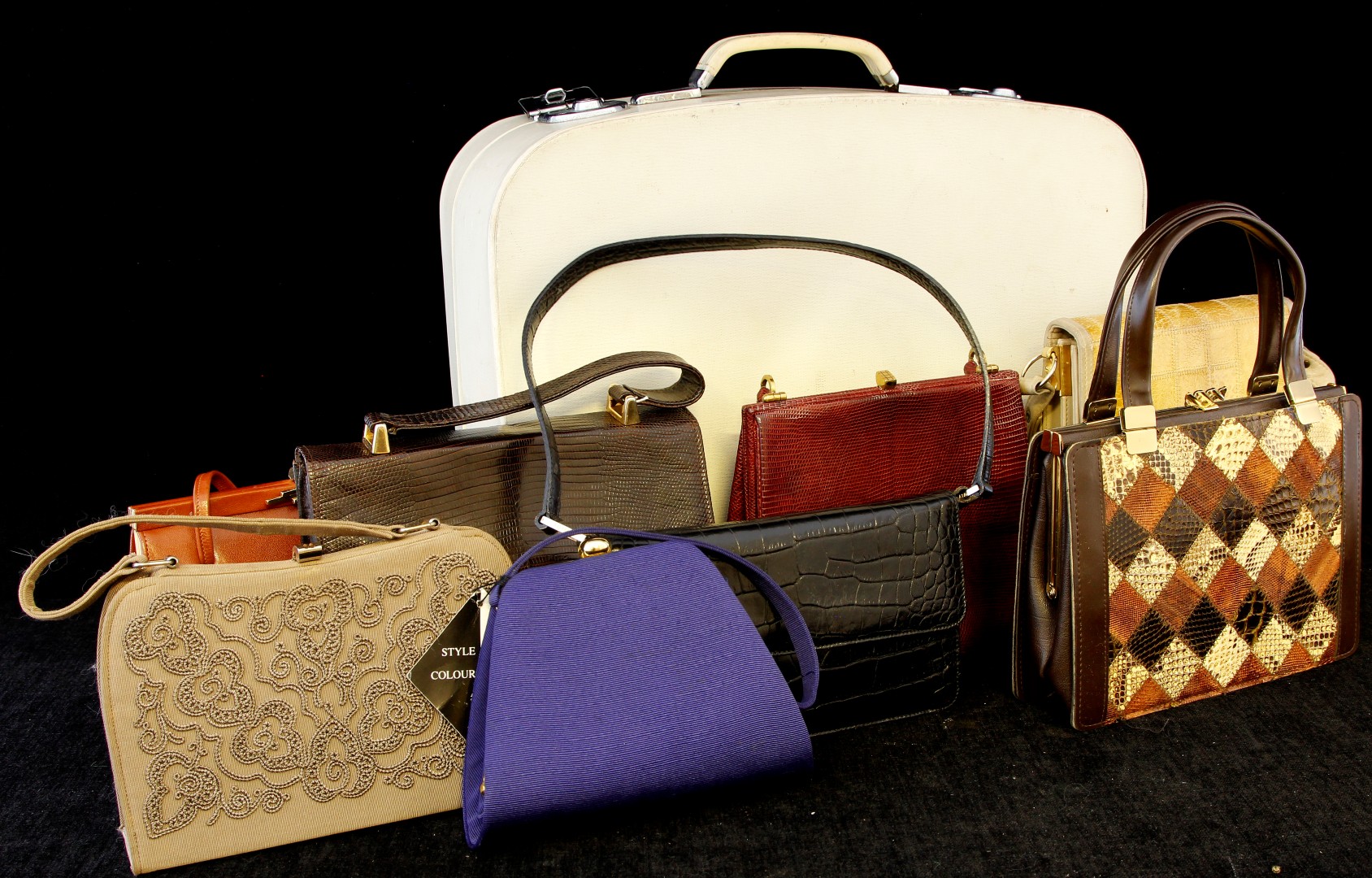 A collection of eight vintage handbags to include Mappin & Webb example, snakeskin etc, all