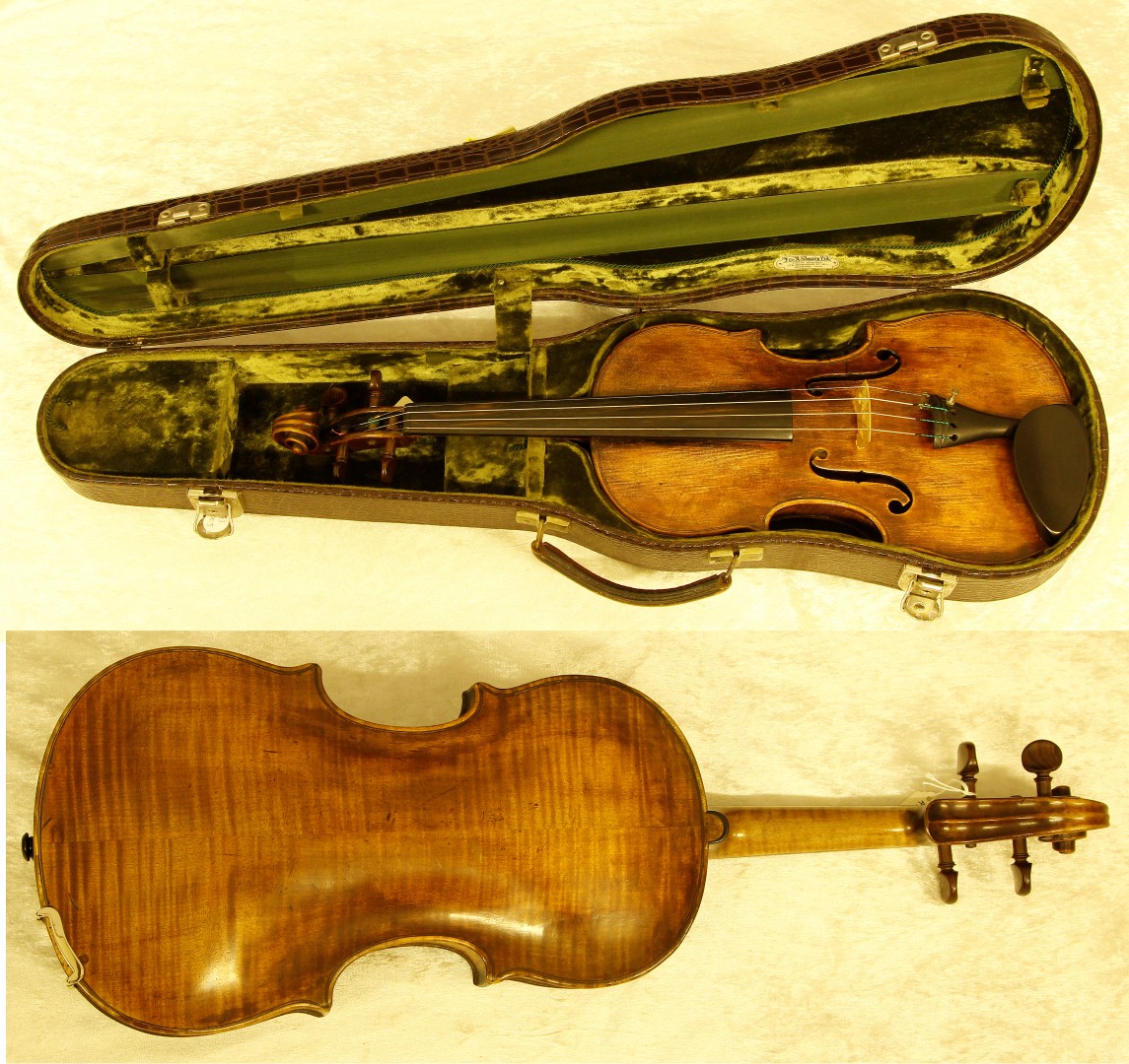 An early 19th century Mittenwald violin with two piece back, length of back 36cm, cased (