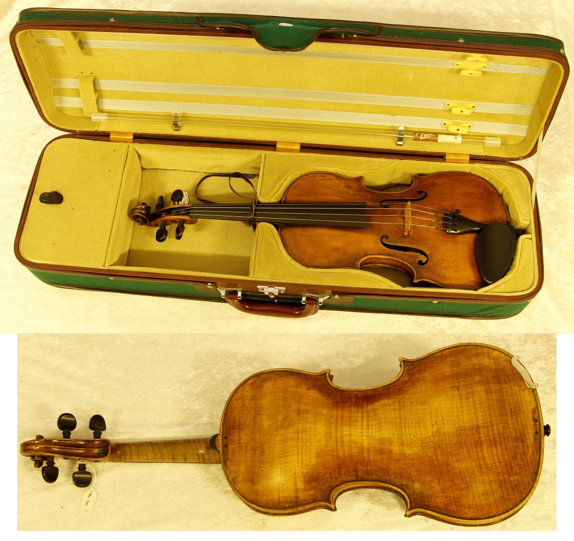 An early 19th century violin with single piece back, labelled Schweitzer, also bearing label for