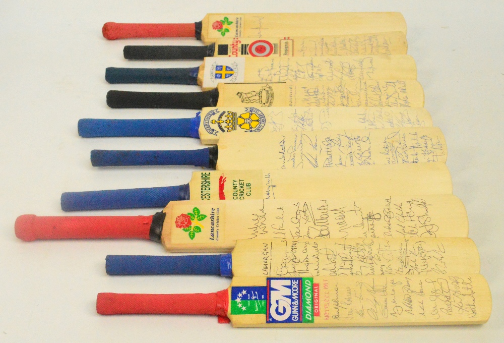 Ten miniature cricket bats signed by Midland and Northern counties, including Lancashire x2, Durham,