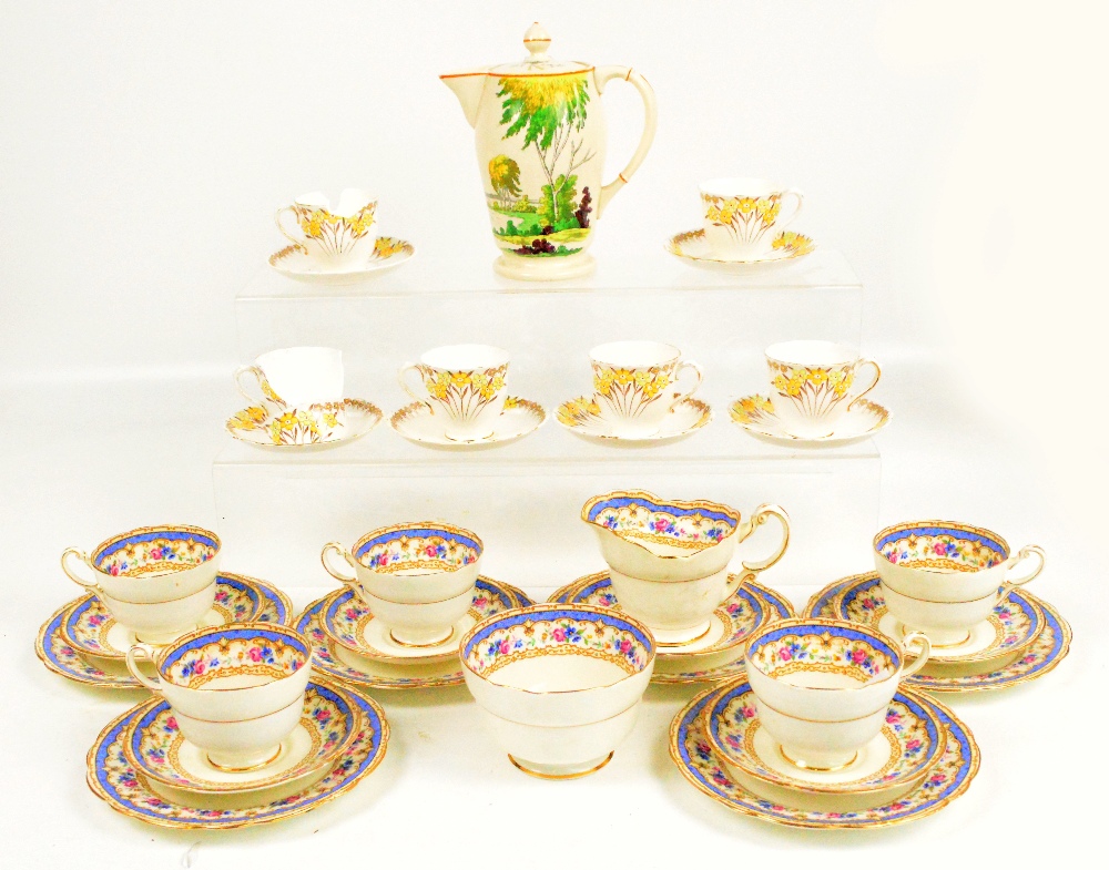 A Paragon floral decorated part tea service comprising five cups, six saucers, six side plates, milk