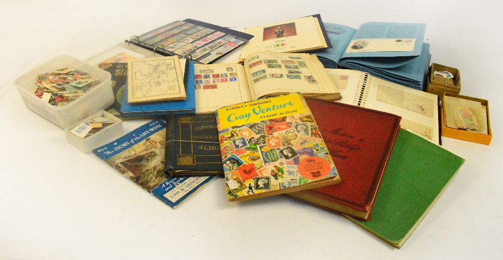 A collection of world stamps in numerous albums, packets, tins, etc, including Great Britain,