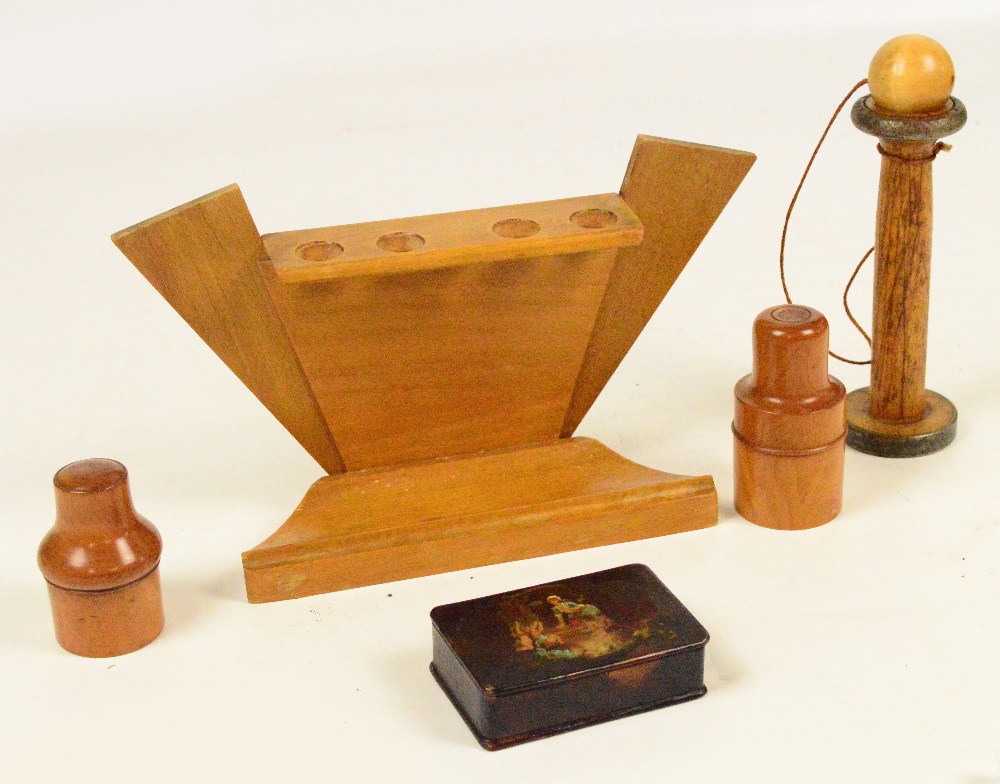 A mixed lot of collectables comprising a geometric 1920's pipe rack, two fruitwood bottle covers,