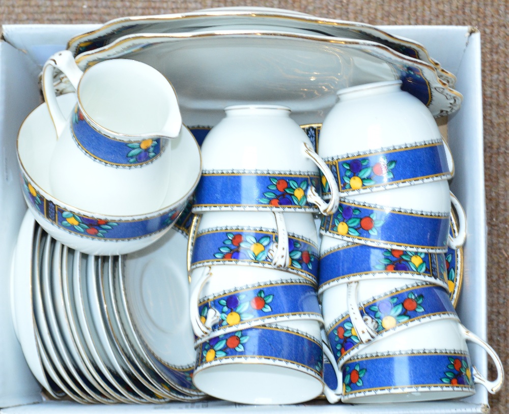 An Adderleys "Java" tea service comprising nine cups, eleven saucers, twelve plates, milk jug, sugar