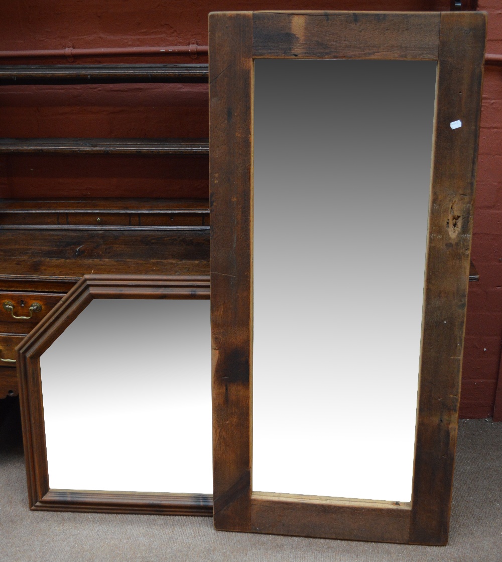 A rustic framed rectangular wall mirror, the plate 45 x 117cm, and an over mantel mirror (2).