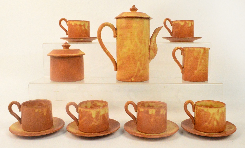 A Vallauris coffee service; comprising coffee pot, milk jug, sucrier, six cups and six saucers.