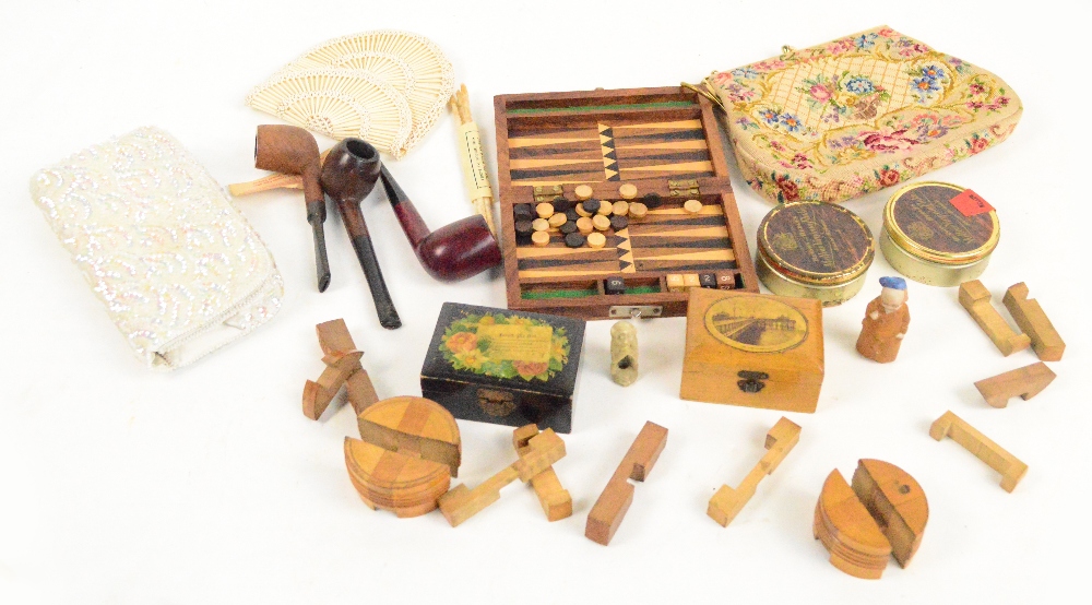 A mixed lot of collectables including a treen puzzle (complete), three vintage purses, pipes, etc.