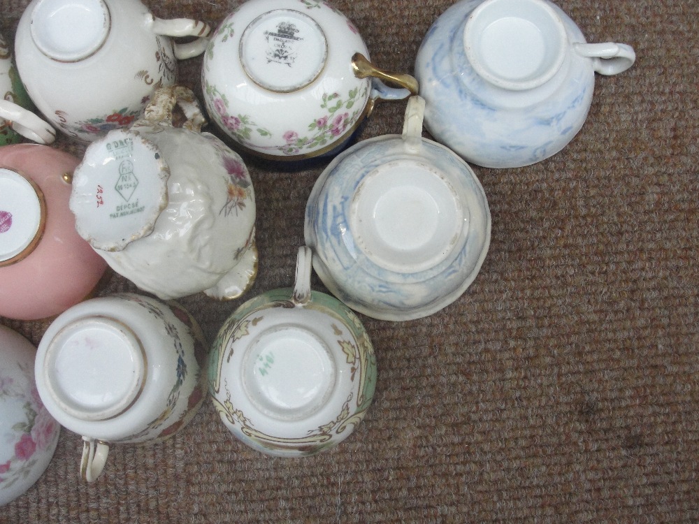 A collection of 19th and early 20th century cups and saucers including Minton, also three jugs and a - Image 3 of 4