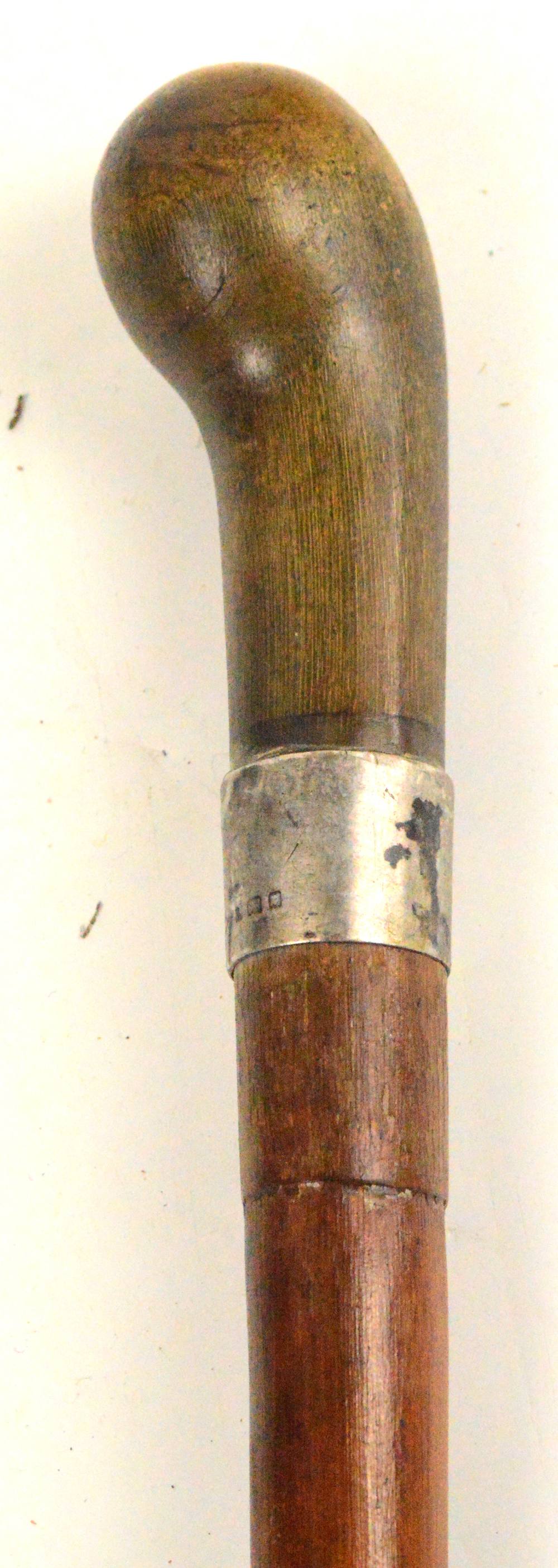 A c.1900 walking cane with horn handle, silver band (hallmarks unclear) and bamboo shaft, length - Image 2 of 2