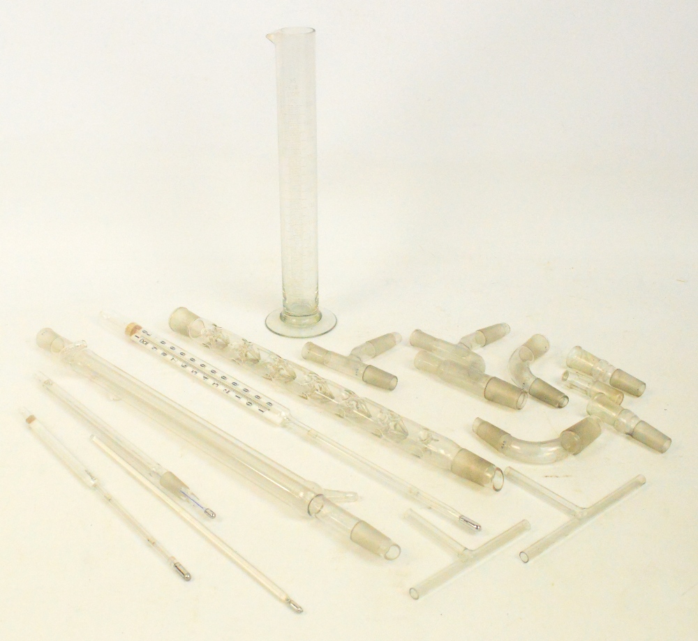 A collection of scientific glassware to include a Tower's Streamline Hydrometer, four immersion