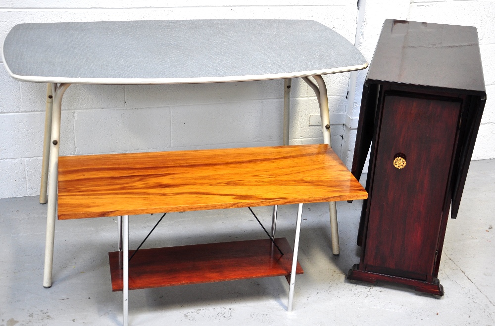 A 1960's kitchen table, a drop leaf table and a small coffee table (3).