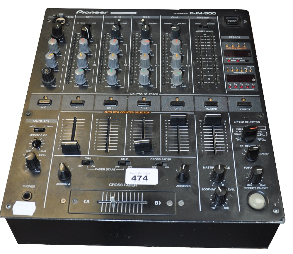 A Pioneer professional DJ mixing desk model DJM-500.