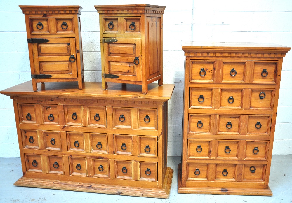 A contemporary pine chest of nine drawers, length 145cm, a matching tall chest of five drawers,