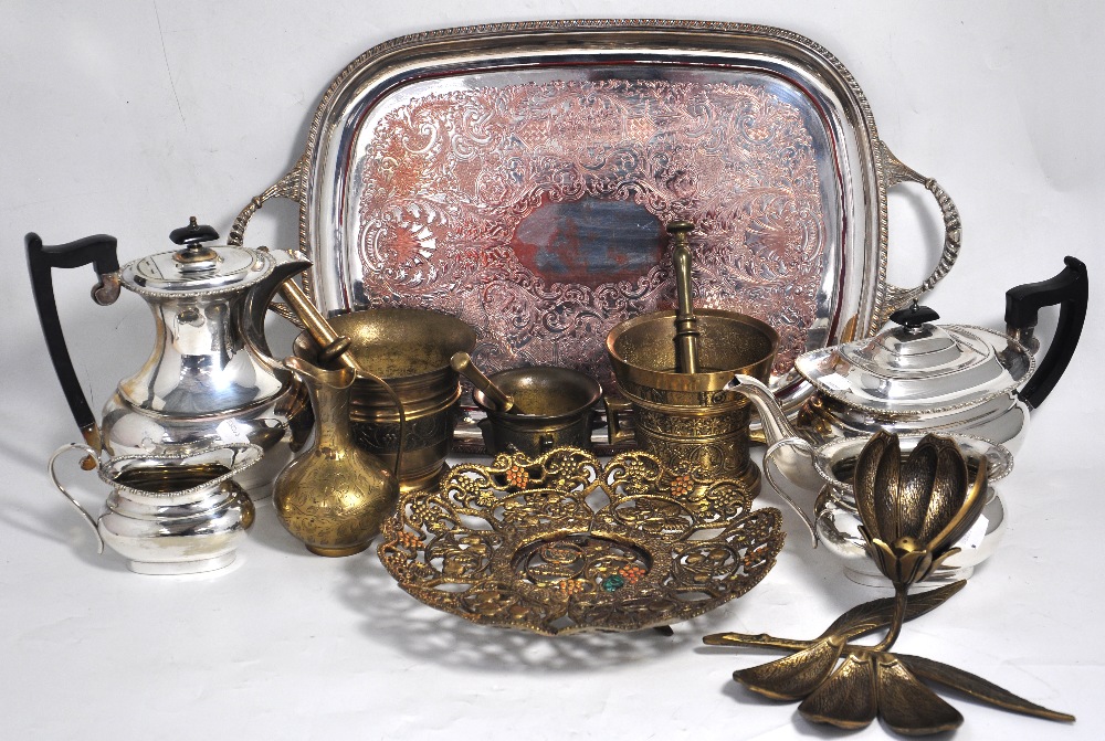 A quantity of plated ware to include teapots and assorted brass ware.