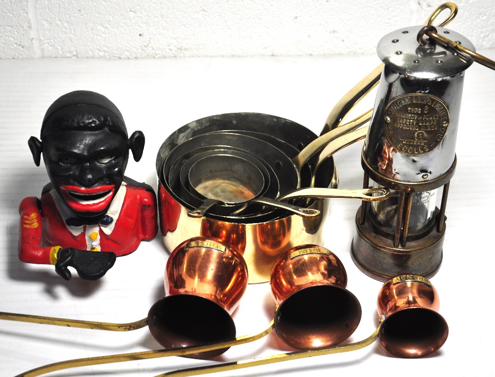 A collectors lot to include brass pans, a miners lamp and a money box.