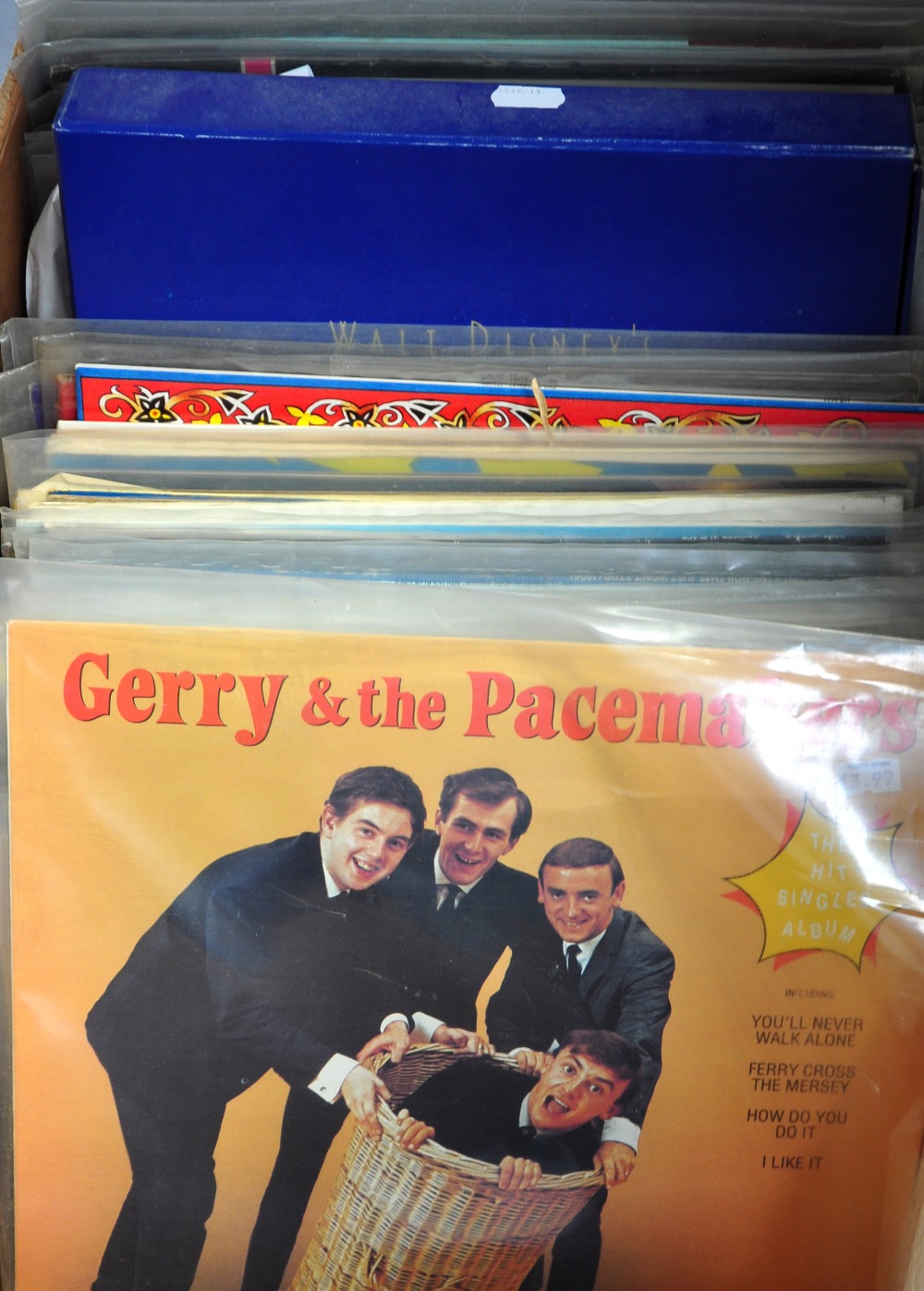 A quantity of vinyl albums to include Buddy Holly, Gerry and the Pacemakers, The Hollies, Rolling