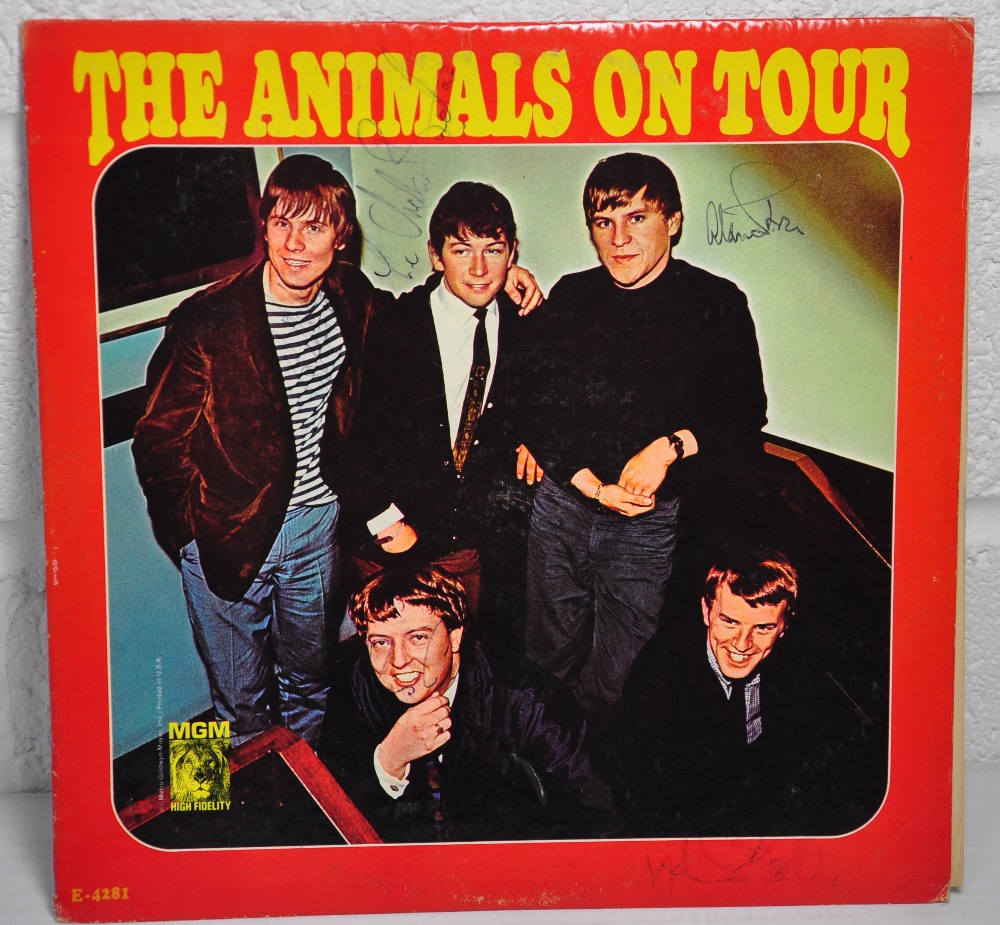 A vinyl album "The Animals On Tour" bearing the signatures of Eric Burden, Alan Price Etc.