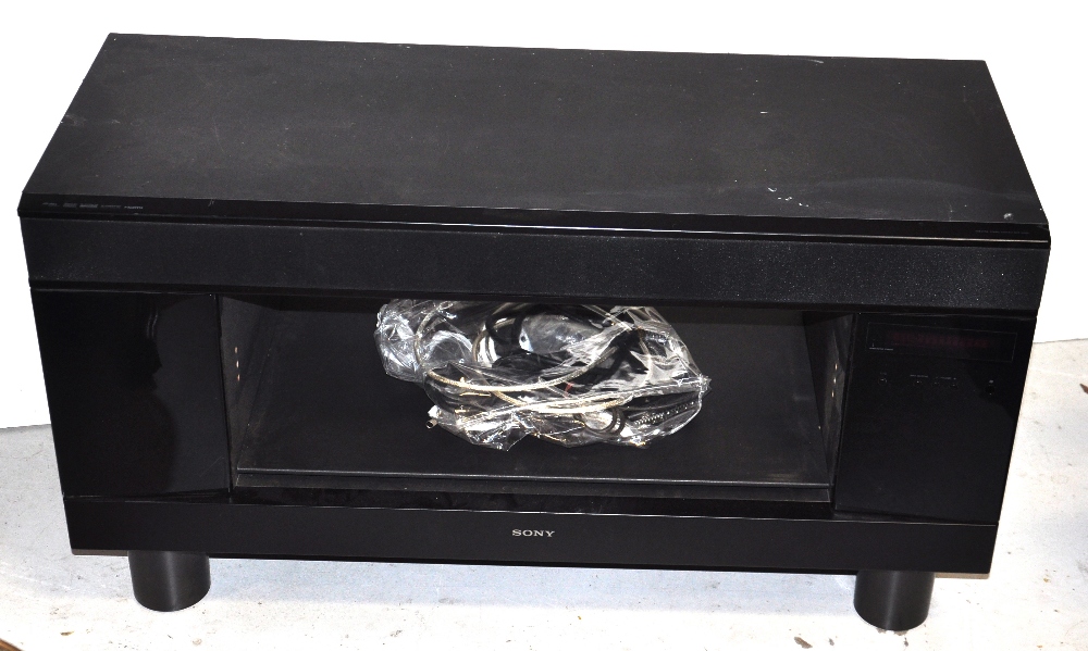 A Sony Bravia surround sound television base unit complete with speakers and sub-woofer etc,