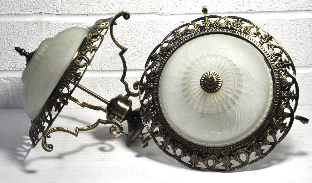 A pair of circular gilt framed plafonnier each with Murano frosted glass shades and scrolling