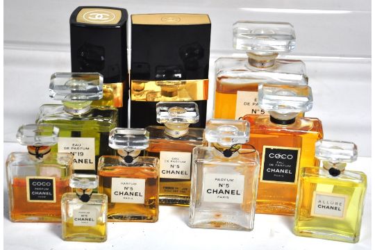 Two Chanel  black perfume bottles, five Chanel original vintage display  bottles and four othe