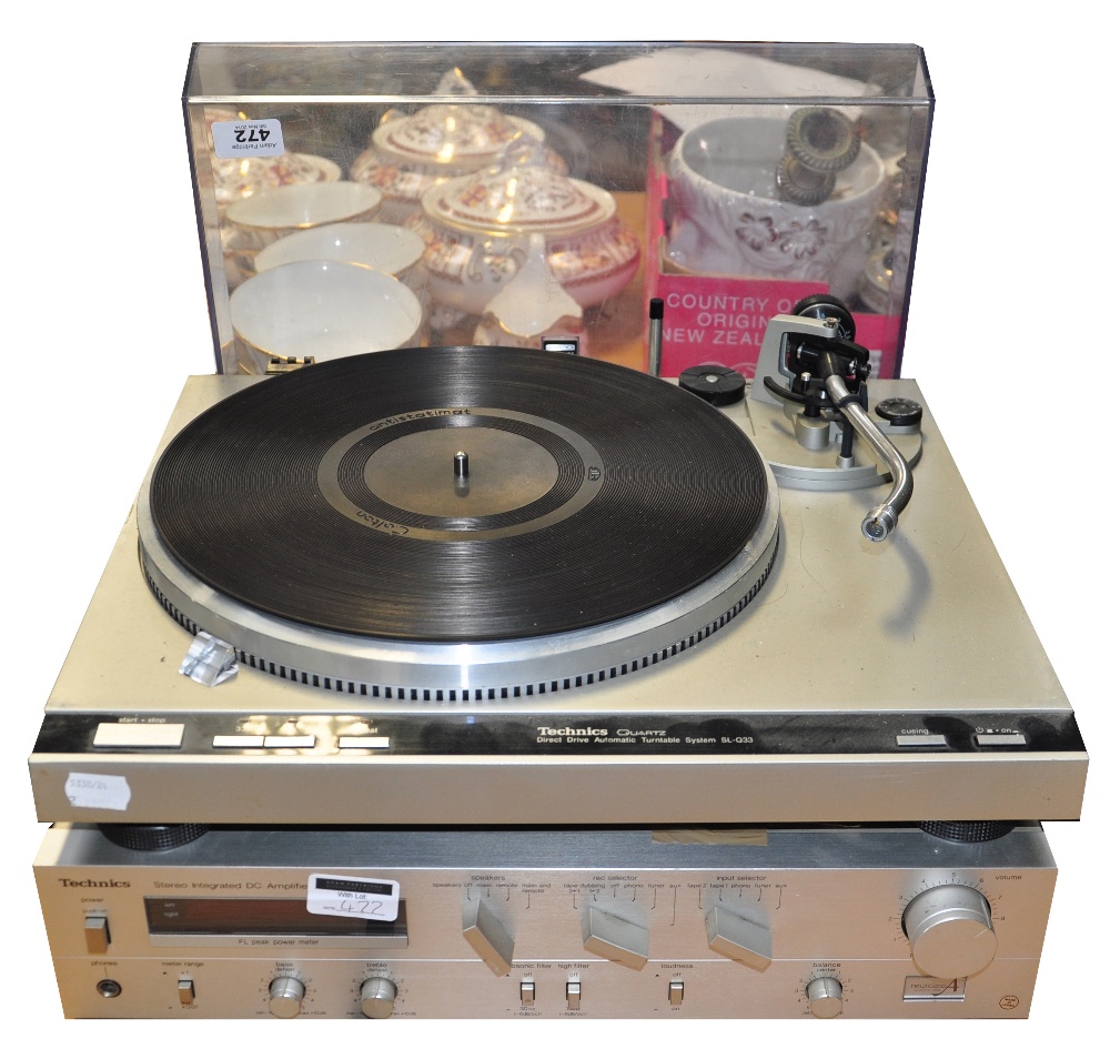 A Technics turntable model SL-Q33 and a stereo amplifier SU-V3 (2).   CONDITION REPORT  Headshell