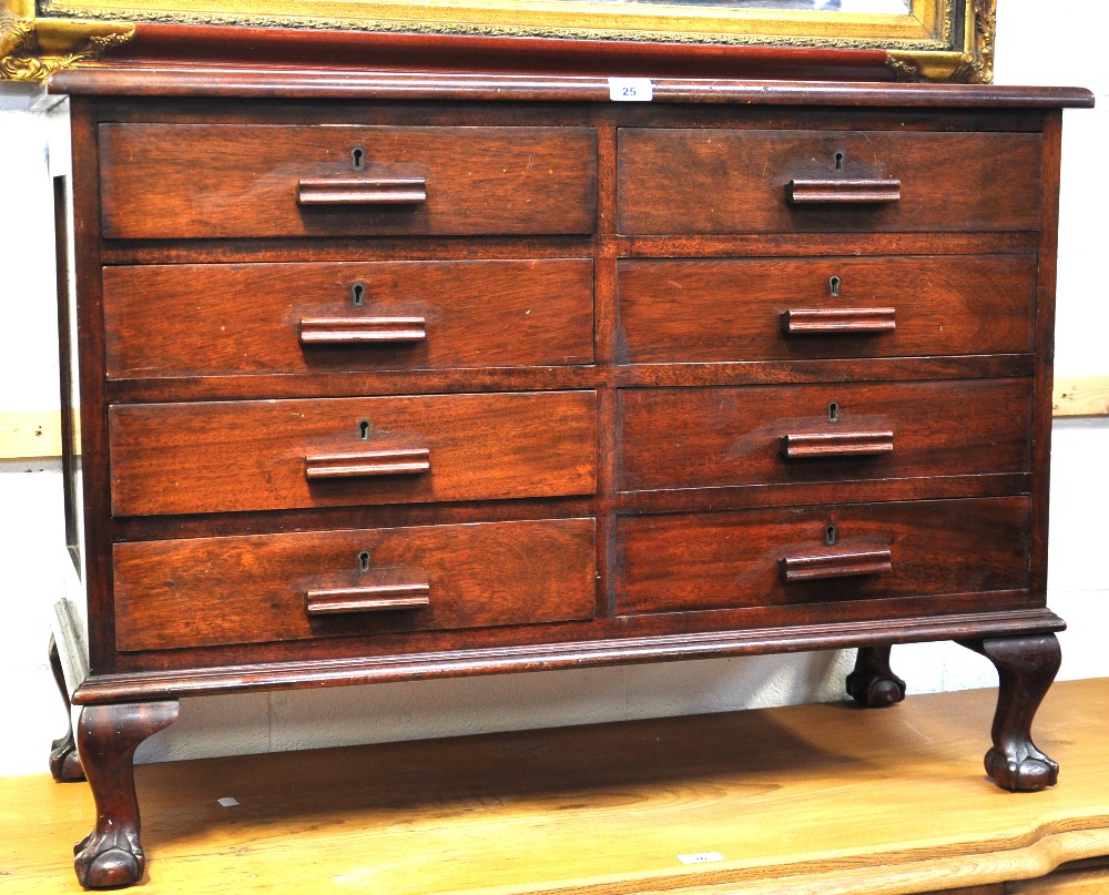 A 20th century mahogany eight drawer chest raised on cabriole legs with ball and claw feet, width