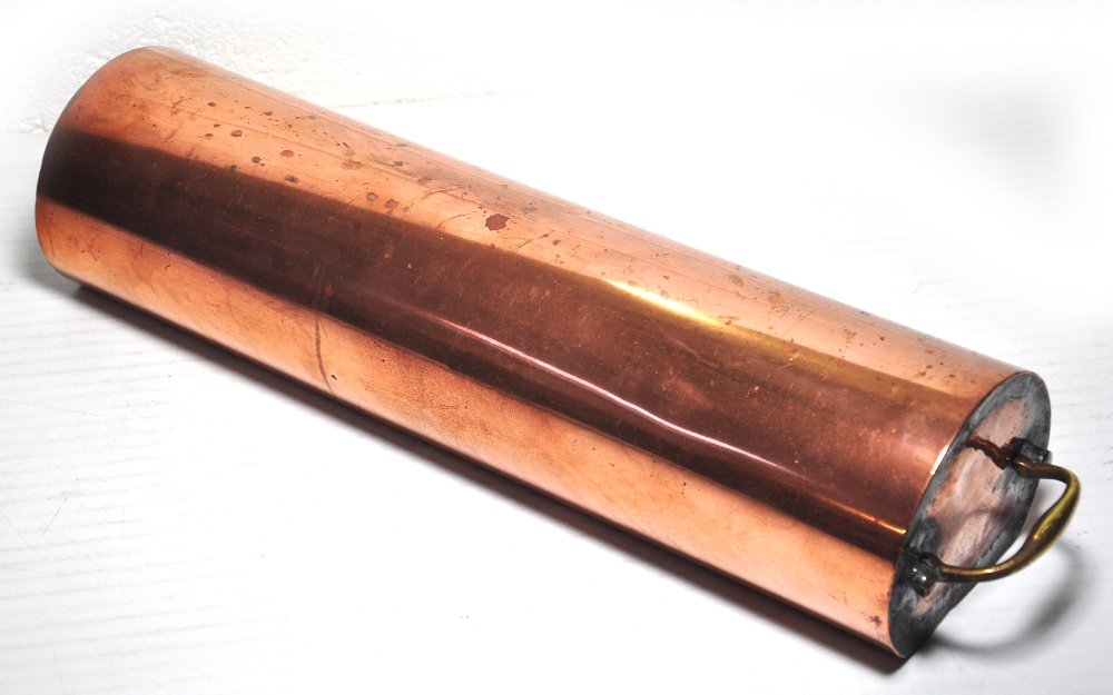 A 19th century copper foot warming pan from a carriage, length 45cm.