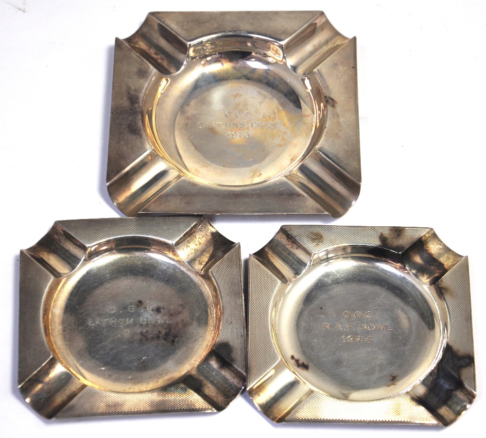 A George VI hallmarked silver ashtray, Birmingham 1950, an Elizabeth II hallmarked silver ashtray,