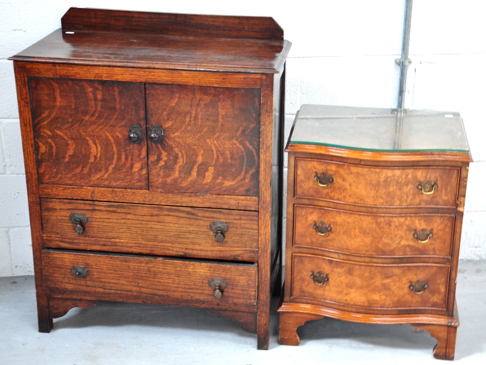 A small reproduction bow fronted chest of drawers and a small oak chest of drawers, 2 drawers with