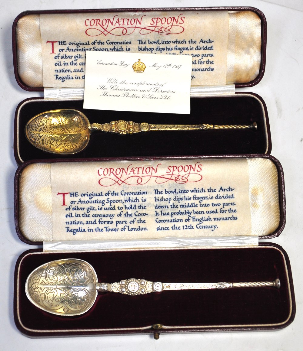 Two cased Edward VII hallmarked silver gilt Coronation spoons, London 1937, combined weight 2.