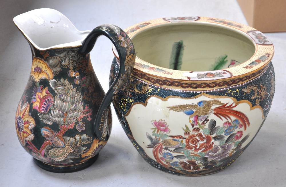 A modern Oriental planter, diameter 35cm, and a modern Oriental jug with character marks to the