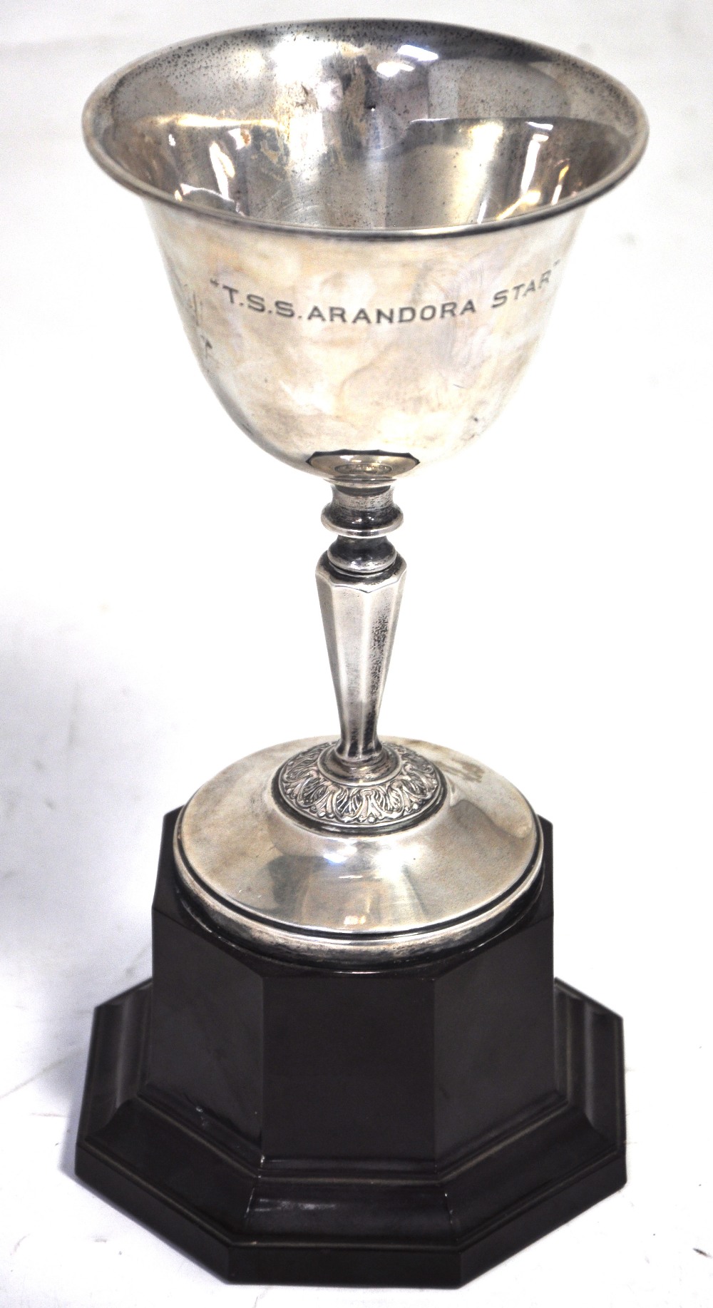 An Edward VIII hallmarked silver cup on stand, Birmingham 1936,  engraved "T.S. Arandora Star" a