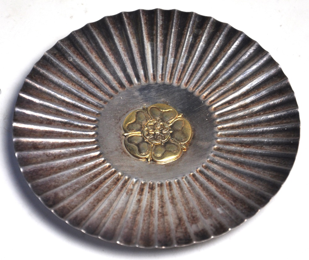 A hallmarked silver dish with Rose to the centre to mark the bicentenary year of the Sheffield Assay
