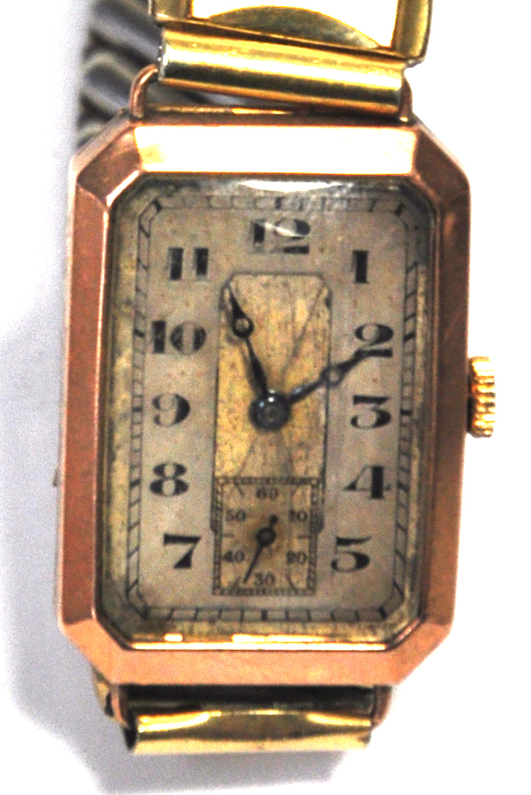 A 9ct gold gents Tank style watch with yellow metal expanding bracelet.