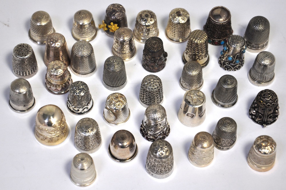 Approx 32 hallmarked silver thimbles various designs, various date marks, approx weight 5.9ozt.