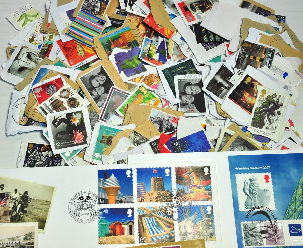 A large quantity of postage stamps and first day covers to include Great Britain definitives and