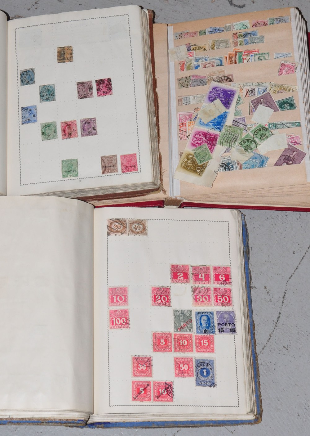 Three stamp albums and a quantity of loose stamps.