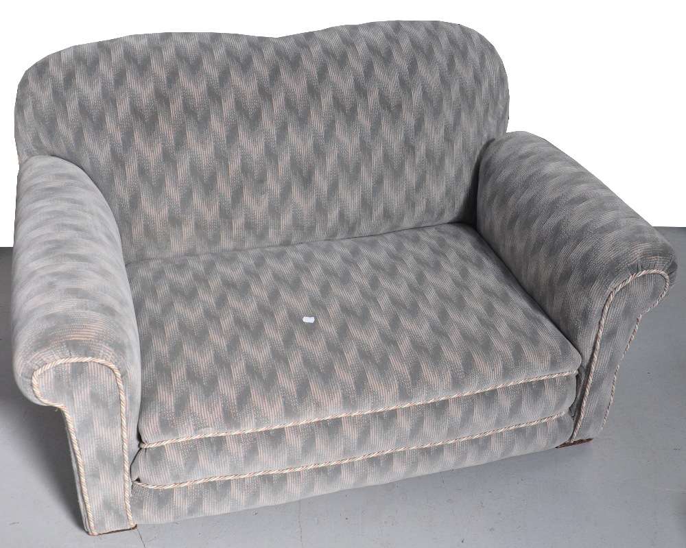 A 20th century two seater sofa upholstered in fabric from Liberty's, length 130cm.