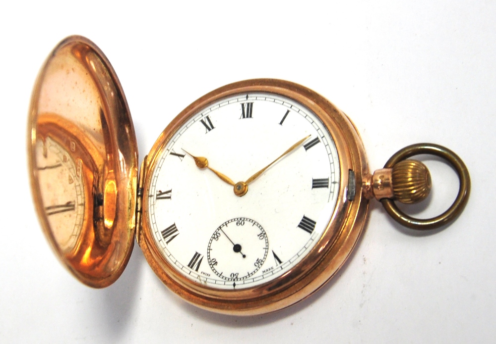 An 9ct gold full hunter crown wind pocket watch, the enamel dial set with Roman numerals, bearing