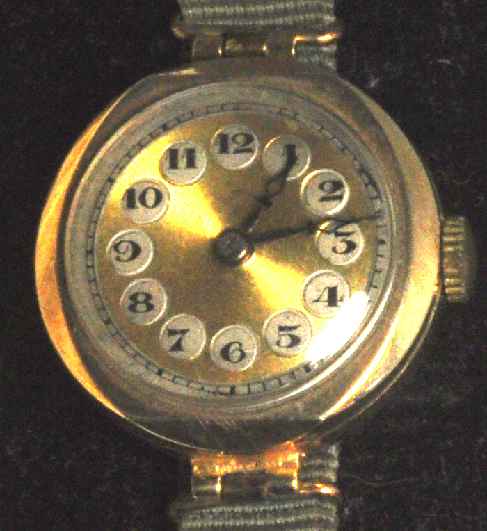 A vintage 1930's ladies wristwatch with an engine turned dial and Arabic numerals.