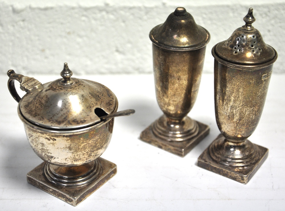 An Edward VIII hallmarked silver salt, pepper and mustard with spoon, Sheffield 1936, approx weigh