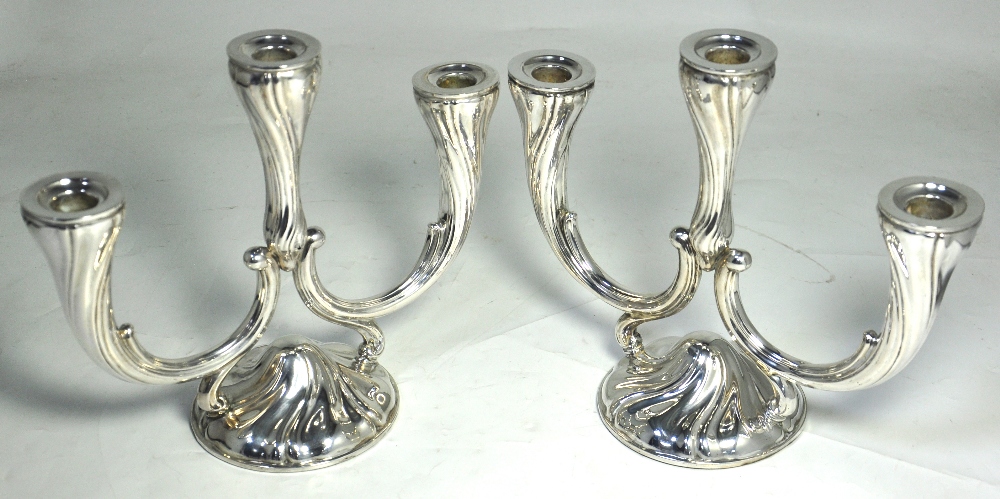 A pair of German three branch silver candelabra, marked 838 c.1940, 26cm (2).