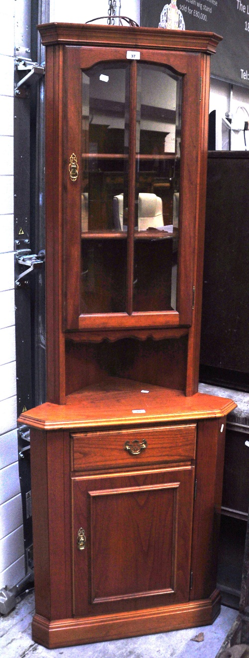 A reproduction corner unit with glazed cupboard to the top, height 190cm.