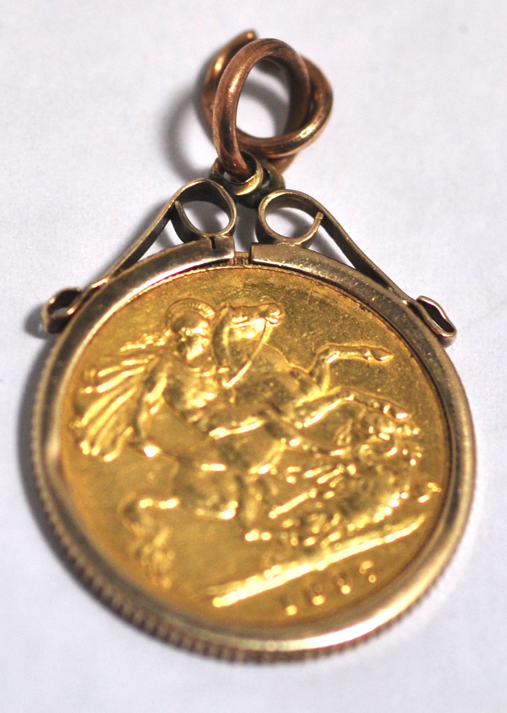 A Victoria half sovereign, 1897, in a pendant mount.